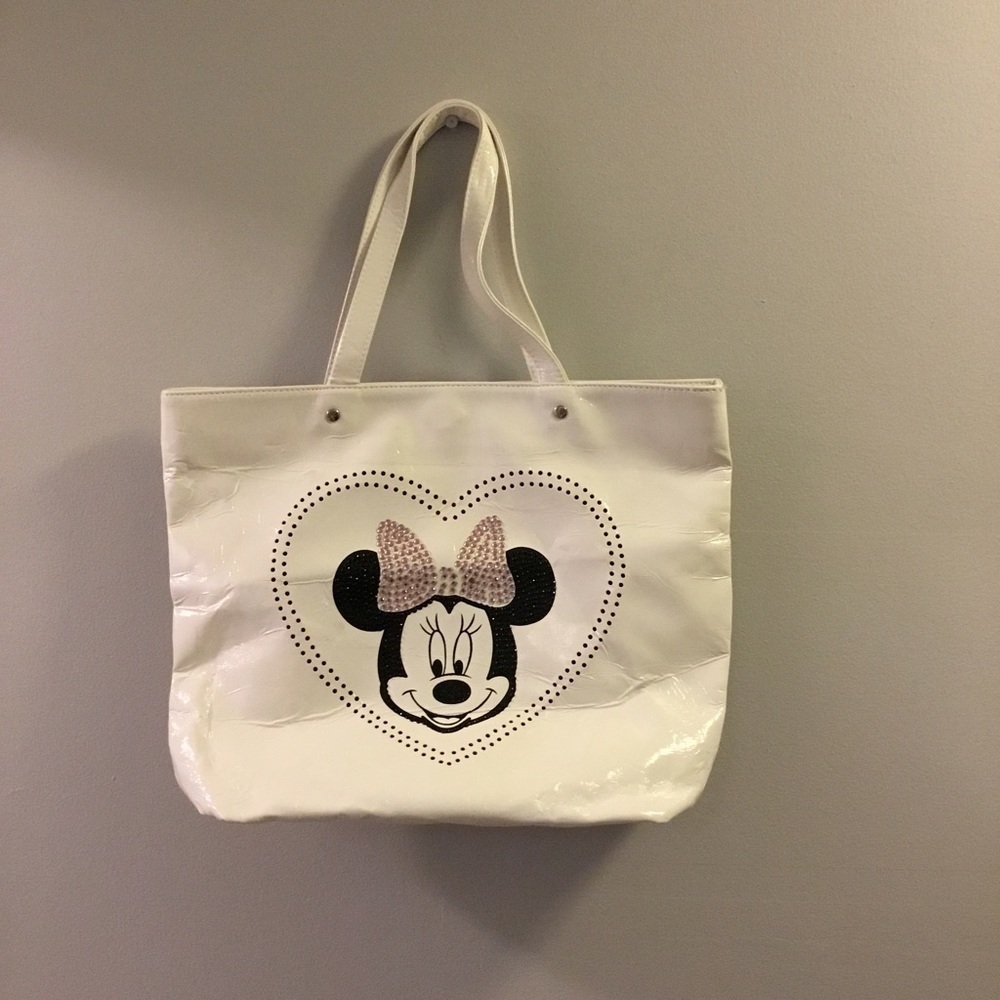Disney Woman’s tote featuring Minnie Mouse with magnetic snap closure